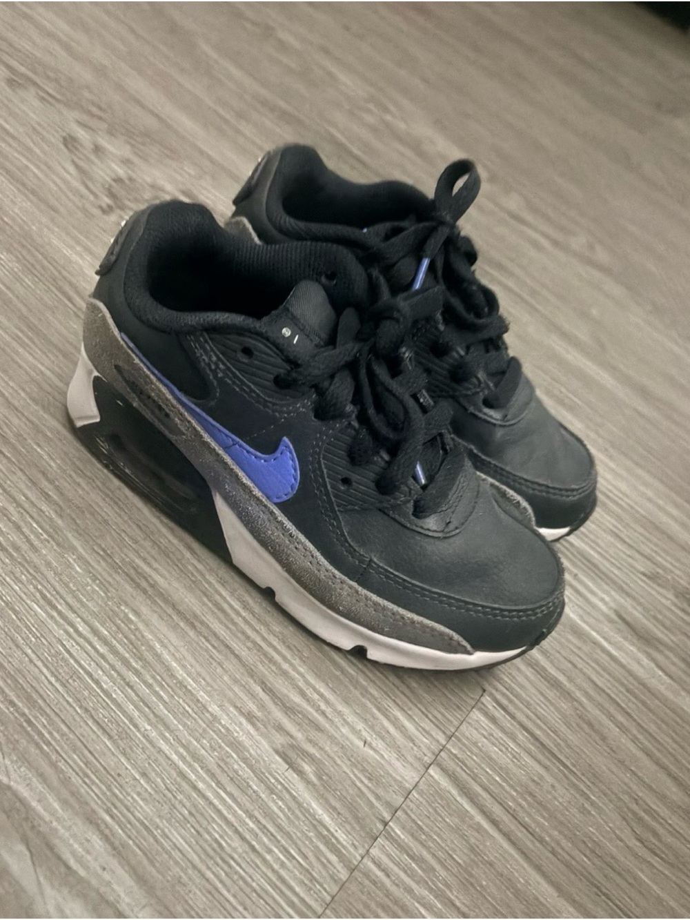 Nike Kids Black Sneakers with Blue Swoosh